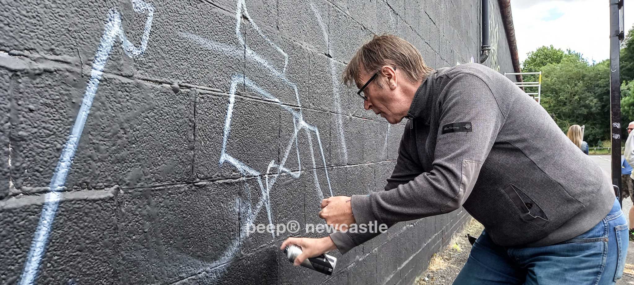 Mr_Zee Street Artist creating outline at The Bridge Hip Hop Uk festival with peep Newcastle